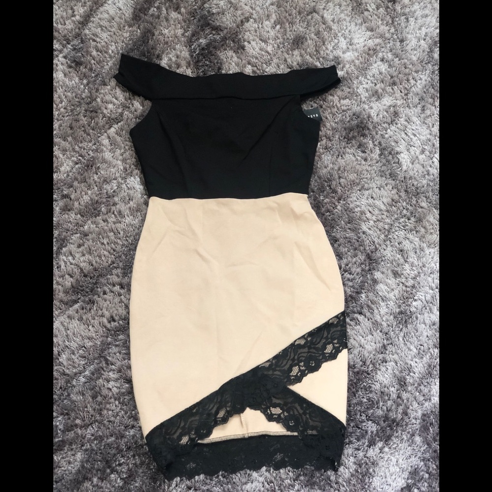 Tan and black off the shoulders cocktail dress.